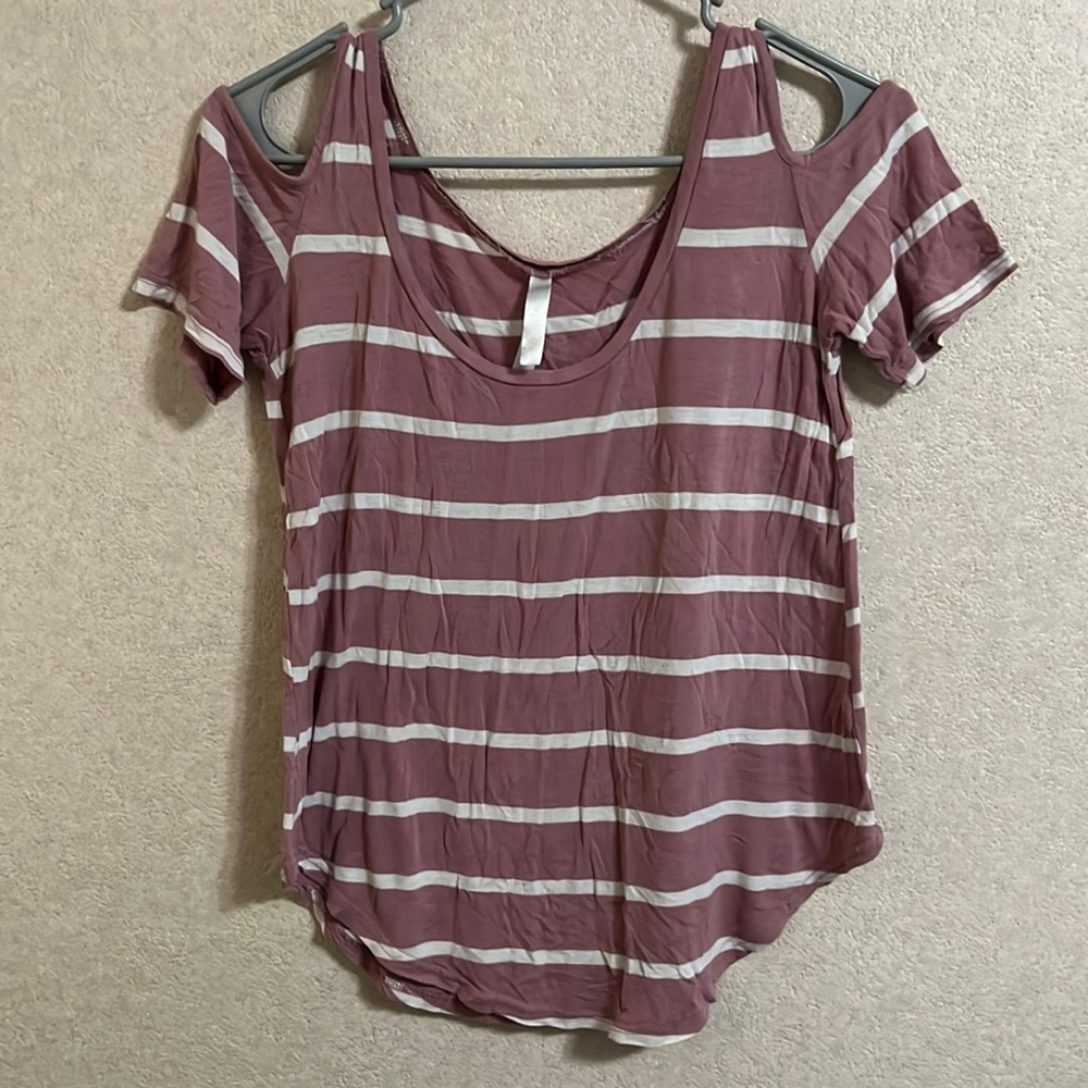 This is a pink/white striped blouse with short sleeves and shoulder gaps.